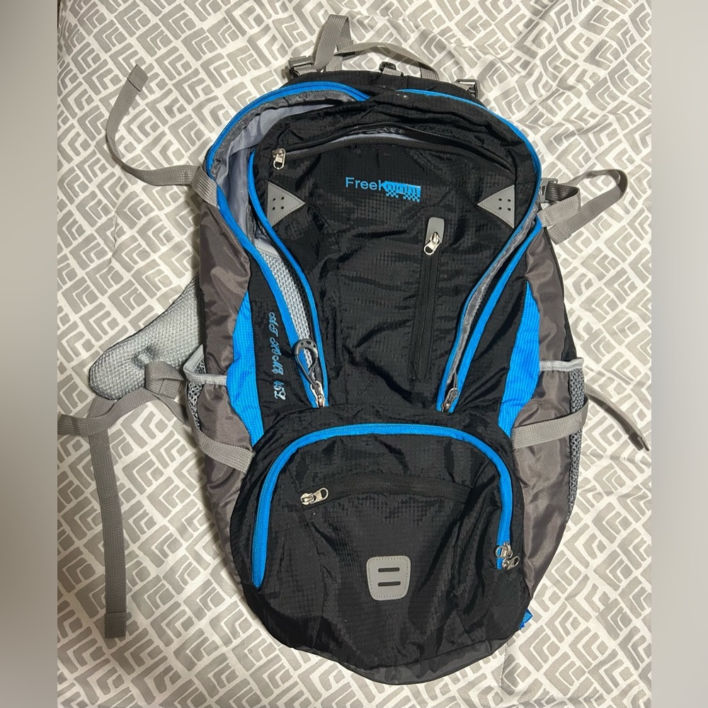 Used FreeKnight Backpack- black and grey w/ blue trim